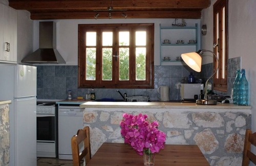 Chalikeri House | Exceptional sea views from this delightful villa nestled into the hillside.