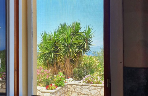 Chalikeri House | Exceptional sea views from this delightful villa nestled into the hillside.