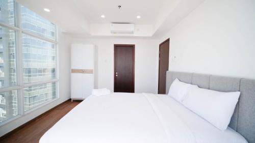 Surabaya Apartment | Exclusive and Spacey 3BR at Grand Sungkono Lagoon Apartment By Travelio