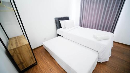 Surabaya Apartment | Exclusive and Spacey 3BR at Grand Sungkono Lagoon Apartment By Travelio