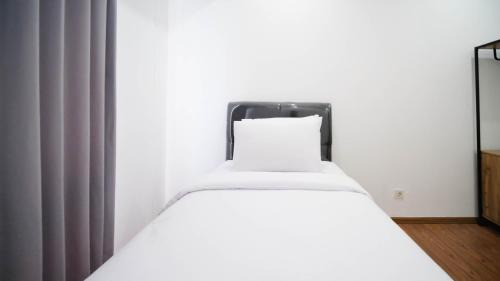 Surabaya Apartment | Exclusive and Spacey 3BR at Grand Sungkono Lagoon Apartment By Travelio