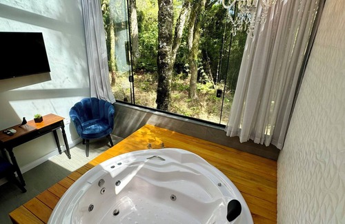 Carniel House | Exclusive Loft with Jacuzzi and Fireplace