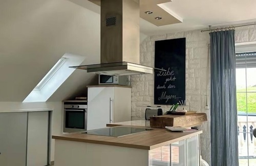 Lengfurt Apartment | Exclusive sunny top floor apartment with views of the countryside