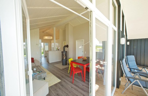 Wesselburenerkoog House | Exclusive wooden house with high sense right on the North Sea dike