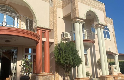 North Legon Apartment | Executive suite with a pool