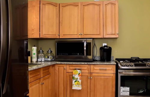 Runaway Bay House | EXOTIC BAYOU "A home away from home experience"