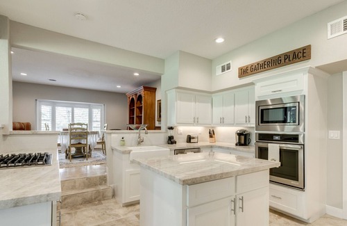 Dickinson House | Expansive home on the water with dock, large deck, shared pool & central AC