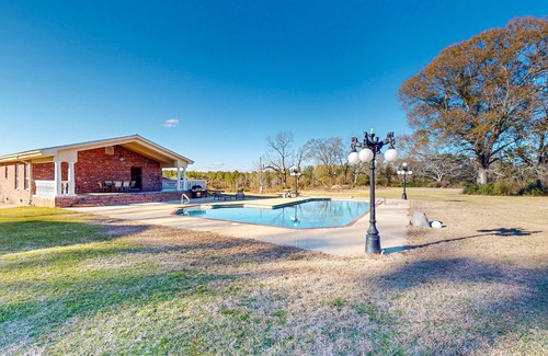 Magnolia House | Expansive property with two homes, ponds, pool, game tables, & hiking trails