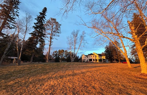 La Pointe House | Experience Island Estate, a grand historic home, downtown LaPointe, 9 bed 7bath