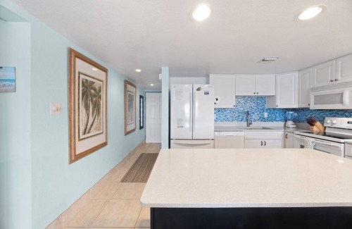 Seven Mile Beach Condo | Experience the turquoise blue waters up close & personal from this unit!