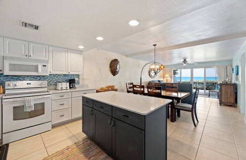 Seven Mile Beach Condo | Experience the turquoise blue waters up close & personal from this unit!