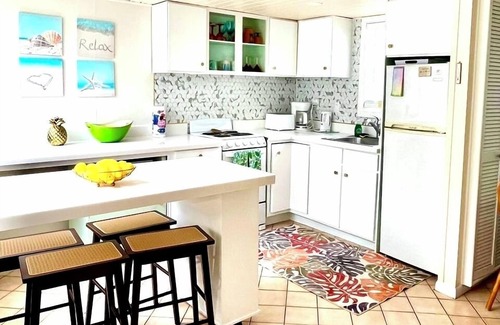 Kittian Village Villa | Experience the perfect blend of comfort and coastal charm in an ideal location.