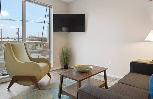 Crossroads Arts District Condo | Experience True Comfort: Relax in our Spacious and Immaculate Concept Studio 345