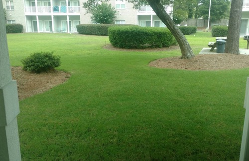 Sunset Beach Condo | Extra large first floor condo with indoor & outdoor pools, close to the beach.