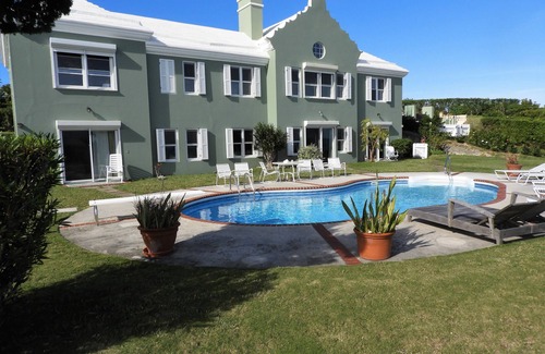Sandys Apartment | Fabulous ocean view, private pool and garden, ideal location.