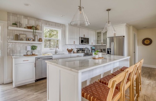 Lincoln City House | Fabulously Updated Ocean View Home with Sunroom, Game Room, Hot Tub, Fire Pit!