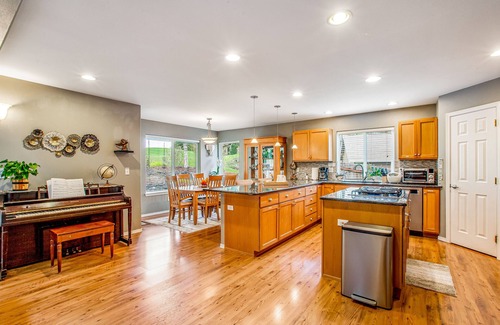 Allyn House | Fairway-view home with deck, grill, central AC, game room, Ping-Pong, & WiFi