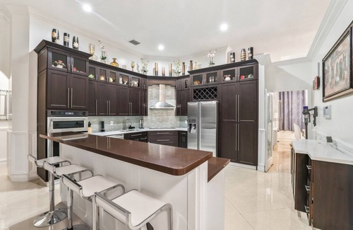 Palmetto Bay House | Family 4BR Escape Pool Arcade Sleeps 12