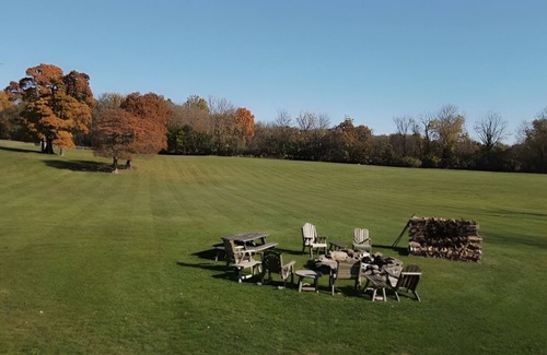 Columbia House | Family Farm Estate: Private Outdoor Paradise with Two Houses, Pond, & Golf Range