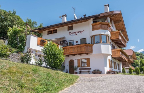 Lajen Apartment | Family-Friendly Apartment “Alpe Unterkehrhof” with Mountain View, Garden & Terrace