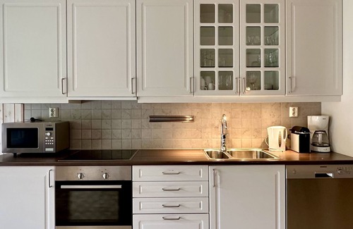 Hafjell Apartment | Family-friendly apartment in Hafjell ski in/out, fireplace, sauna and wifi