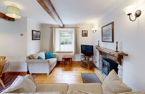 Margam Cottage | Family friendly coachhouse in idyllic setting with extensive private grounds and free WiFi