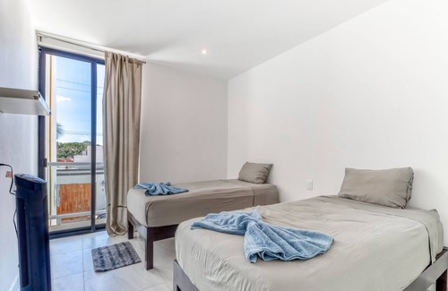Villas Tulum Apartment | Family-friendly getaway with a balcony, partial AC, WiFi, kitchen & shared pool!