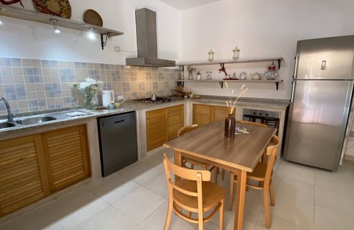 Galtelli Apartment | Family-friendly holiday home nestled in nature with a garden, near the sea