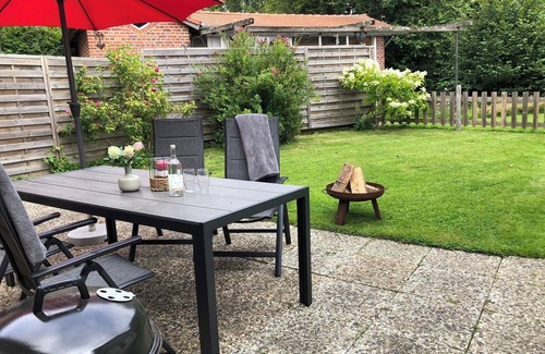 Grundhof Apartment | Family-friendly Krischan vacation apartment with quiet, fenced garden.