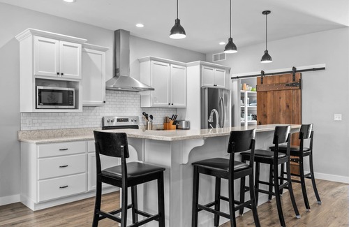 Coloma House | Family Friendly lake home, beach, level lot, fire pit, game room, dog friendly!