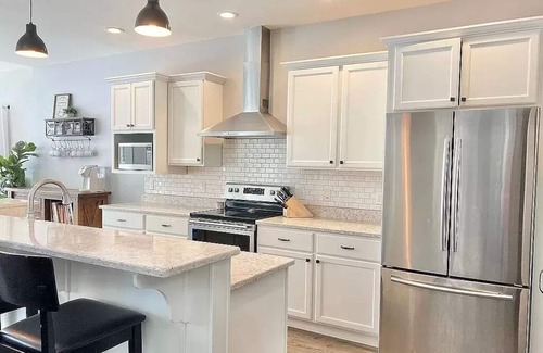 Coloma House | Family Friendly lake home, beach, level lot, fire pit, game room, dog friendly!