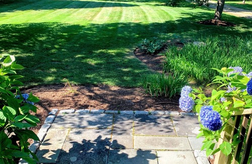 West of Town House | Family Friendly Oasis: Private Acre, Heated Pool, Bikes, Walk to Town & Brewery