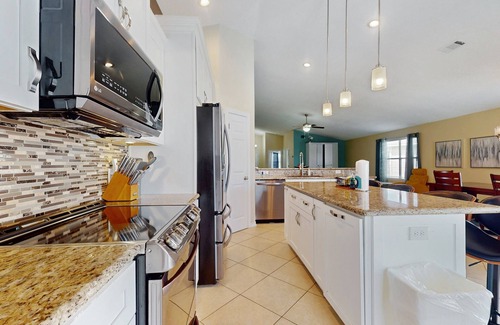 Emerald Shores House | Family home with pool, large fenced-in yard, WiFi, central AC - dog-friendly