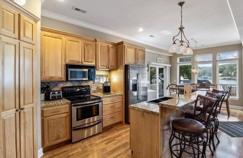 Sunrise Beach House | Family Lakefront Home with Large Private Dock with Boat Slip
