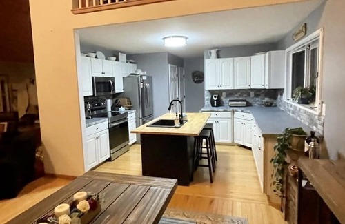 Shrewsbury Ski Chalet | Family Retreat! Large Game Room, fenced in yard with hot tub and fire pit.