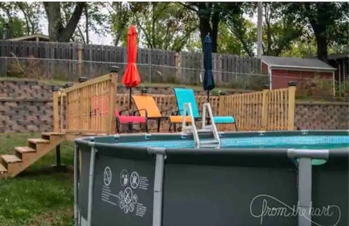 North Central Omaha House | Family-sized home with outdoor pool and deck
