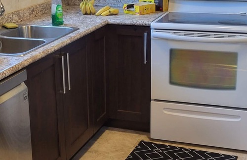 Stoney Creek Condo | Family sized townhouse minutes from downtown. A sanctuary for peace lovers.