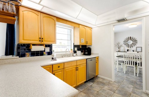 Merritt Island House | Family Vacation Home with pool, canal access for fishing or kayak with dolphins
