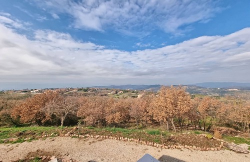 Gualdo Cattaneo Apartment | Farmhouse with panoramic views surrounded by forest in the center of Umbria