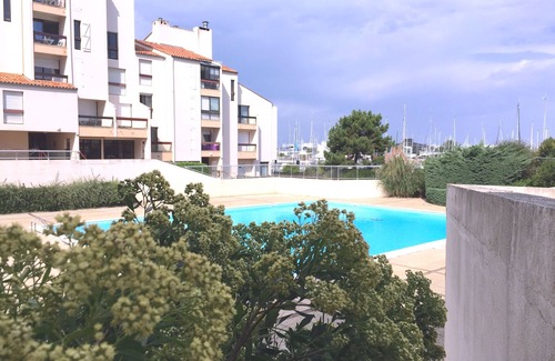La Rochelle Apartment | Feet in the water between beach and marina.