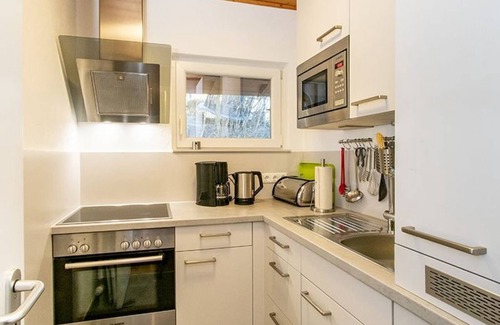 Schwarzenbach House | Ferienhaus 24-f mit Uneinsehbarer Süd-west-terrasse - Ferienhäuser im Feriendorf Weissensee im