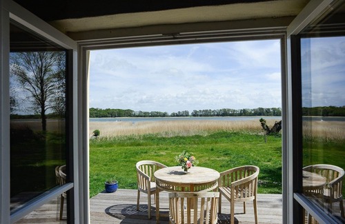 Grubnow House | Ferienhaus Remise direkt am Wasser im Gut Grubnow Rügen