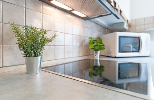 Malente Apartment | Ferienwohnung Hütt 3 mit Wintergarten im Haus Hüttmann in Bad Malente