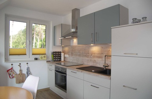 Loddin Apartment | Ferienwohnung Hubertus mit 2 Schlafzimmern und Balkon - Hubertus