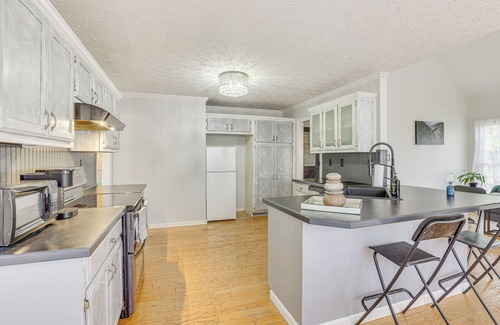 Dacula House | Fire Pit & Wooded Views: Family Home in Dacula!