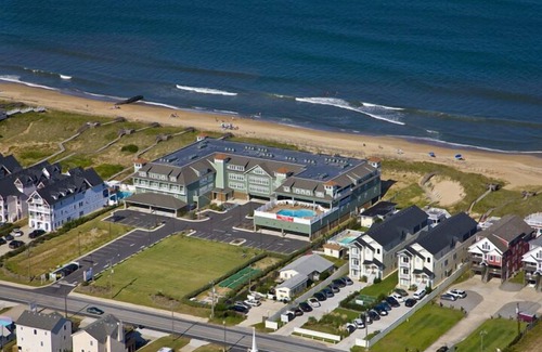 Kill Devil Hills Condo | First Flight Retreat 215: Beachy and Breathable Condo, Oceanfront + Access to Po