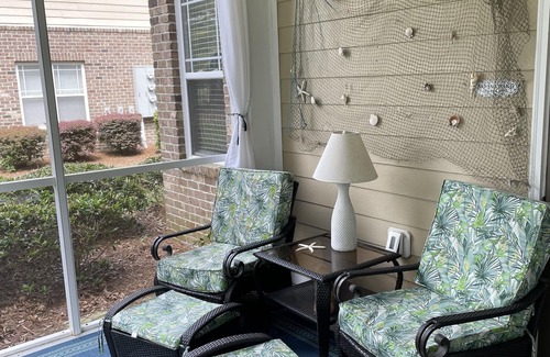Calabash Condo | First floor corner unit overlooking 11th fairway on premier golf course.