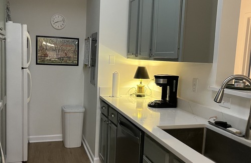 Saint Simons Heights Condo | First floor end unit freshly painted with Updated master bath, and kitchen.