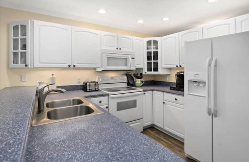 Heron Harbour Isle Condo | First Floor Waterfront Condo with Great Amenities