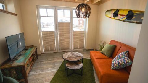 Neuharlingersiel Apartment | Fischerhäuschen am Kurpark-See ohne Schwimmbad- und Saunanutzung